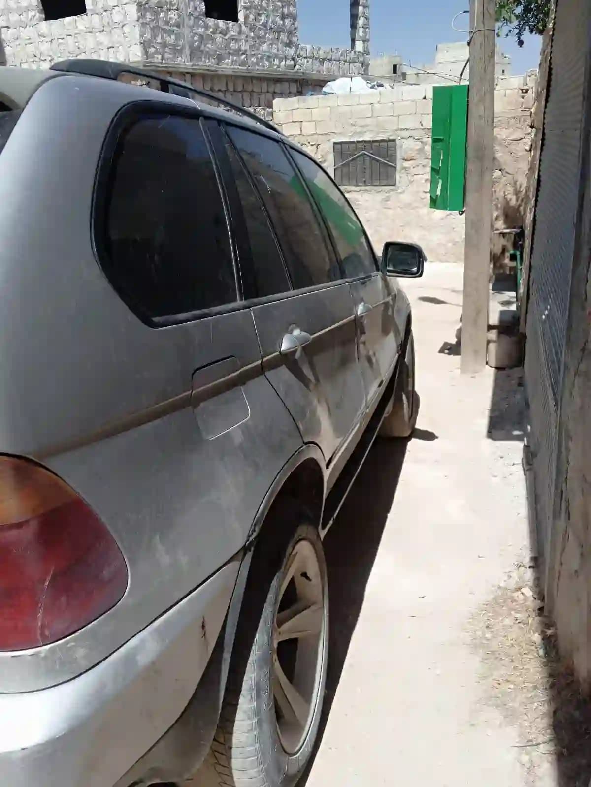 2002 بي إم دبليو X5 - Image 7