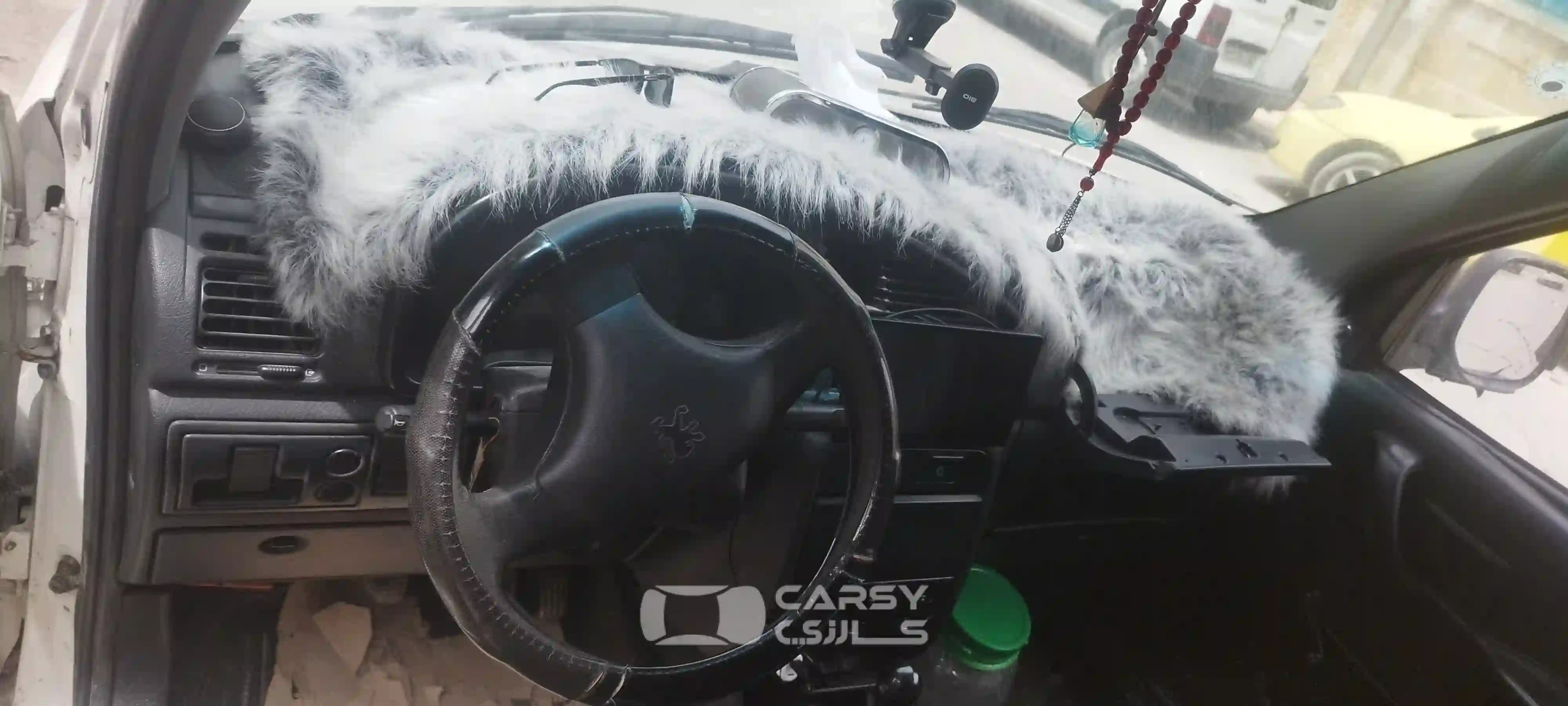 1999 بيجوت بارتنير - Image 9